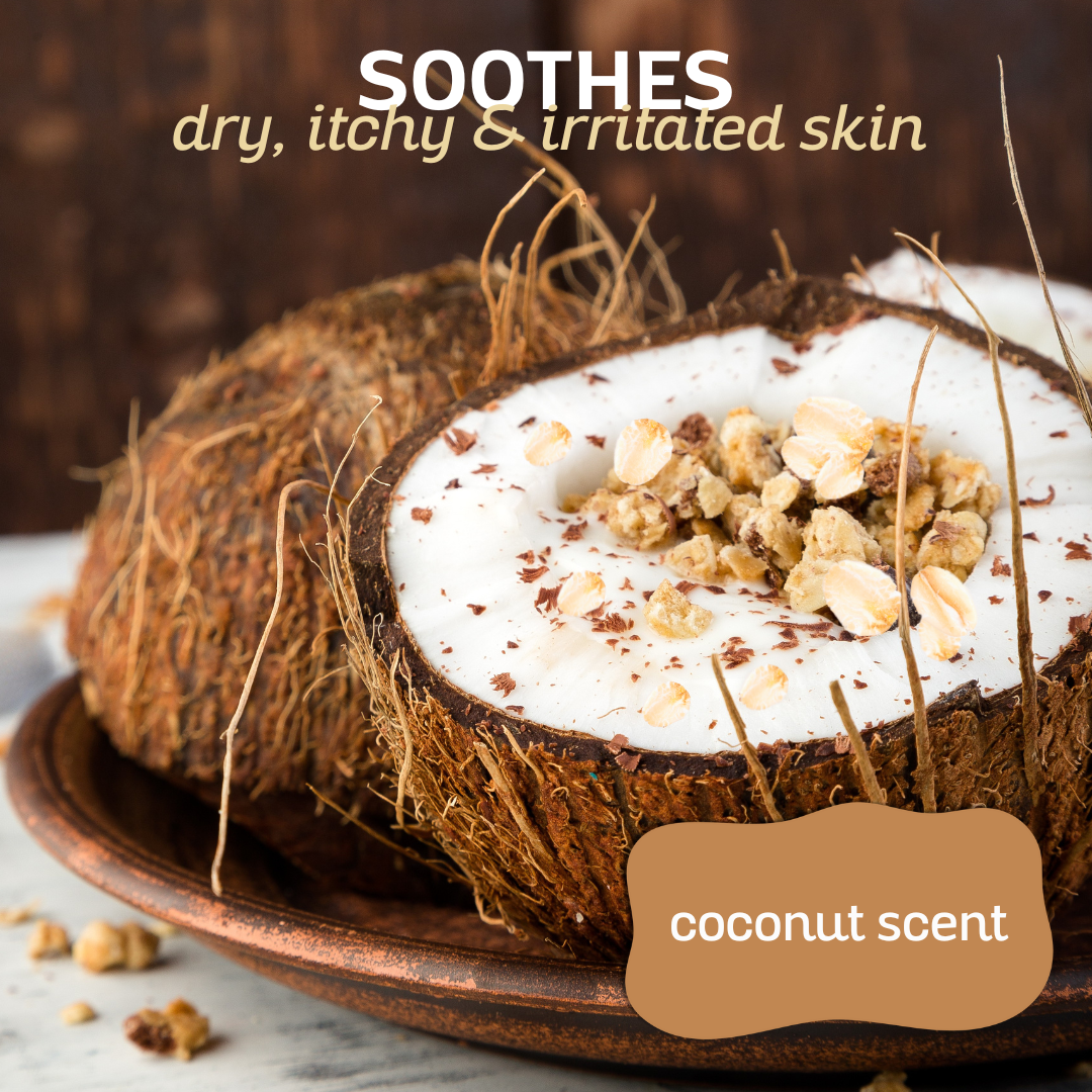 Close-up of a halved coconut filled with oats and granola, accompanied by the text: 'soothes dry, itchy and irritated skin, coconut scent'