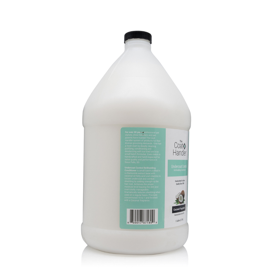 Left side view of The Coat Handler Undercoat Control DeShedding Conditioner gallon jug, showcasing product description