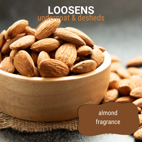 Close-up of almonds in a wooden bowl accompanied by the text: 'loosens undercoat and desheds, almond fragrance'