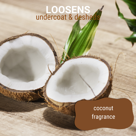 Close-up of a freshly halved coconut on a wooden table accompanied by the text: 'loosens undercoat and desheds, coconut fragrance'