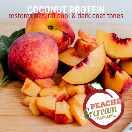 Close-up of peach slices on a wooden cutting board accompanied by the text: 'coconut protein restores natural cool and dark coat tones, peaches & cream fragrance'