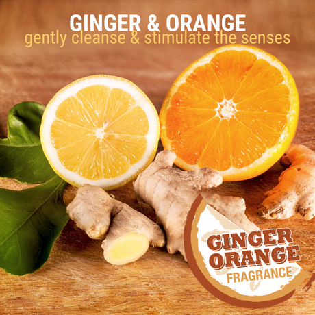 Freshly sliced oranges and ginger roots arranged on a wooden table accompanied by the text: 'ginger and orange gently cleanse and stimulate the senses, ginger orange fragrance'