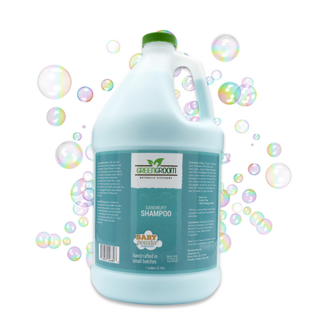 Gallon jug of Green Groom DandRUFF Shampoo displayed with bubbles in the background