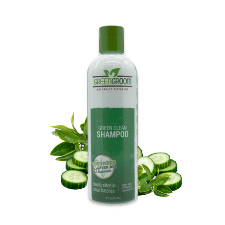 16 oz bottle of Green Groom Green Clean Shampoo displayed with cucumber rounds and green leaves