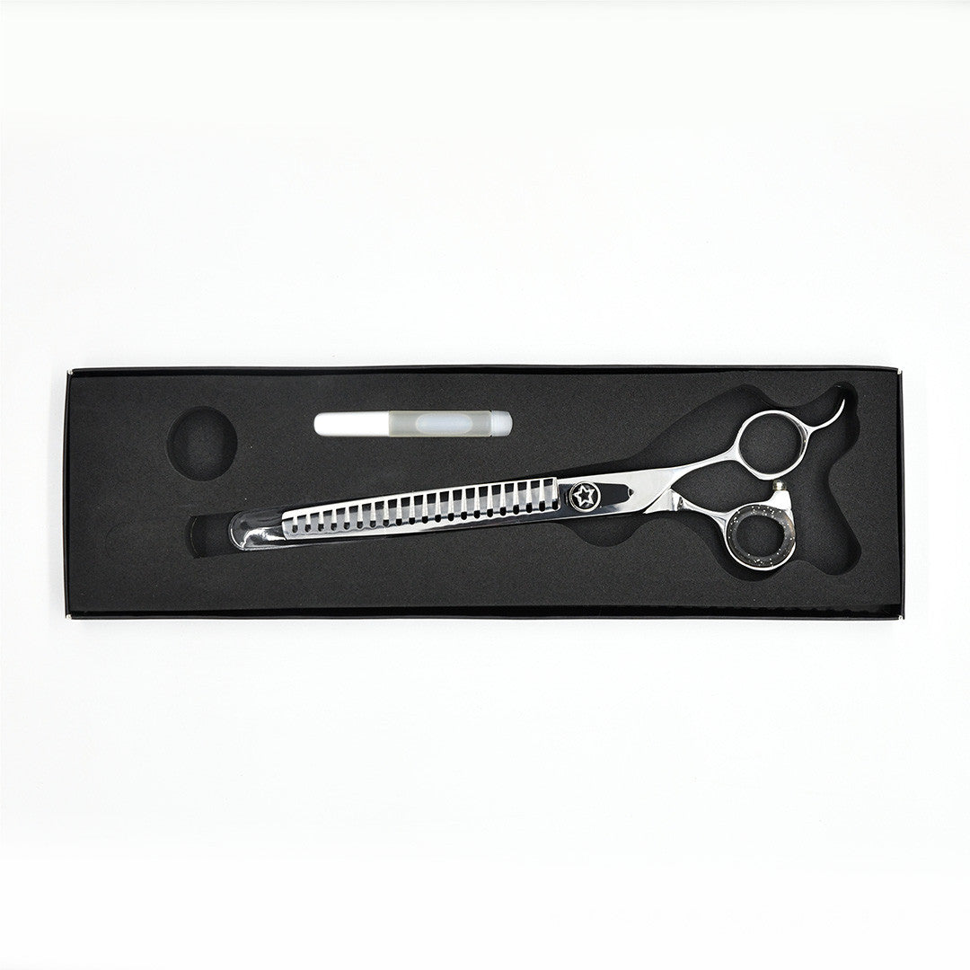 Monk Black 8.25" 21-Tooth Blending Shear in a protective black foam-lined case with gel finger ring and shear oil
