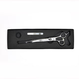 Monk Black 7.5" Curved Shear in a protective black foam-lined case with gel finger ring and shear oil