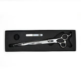 Monk Black 9.5" Curved Shear in a protective black foam-lined case with gel finger ring and shear oil