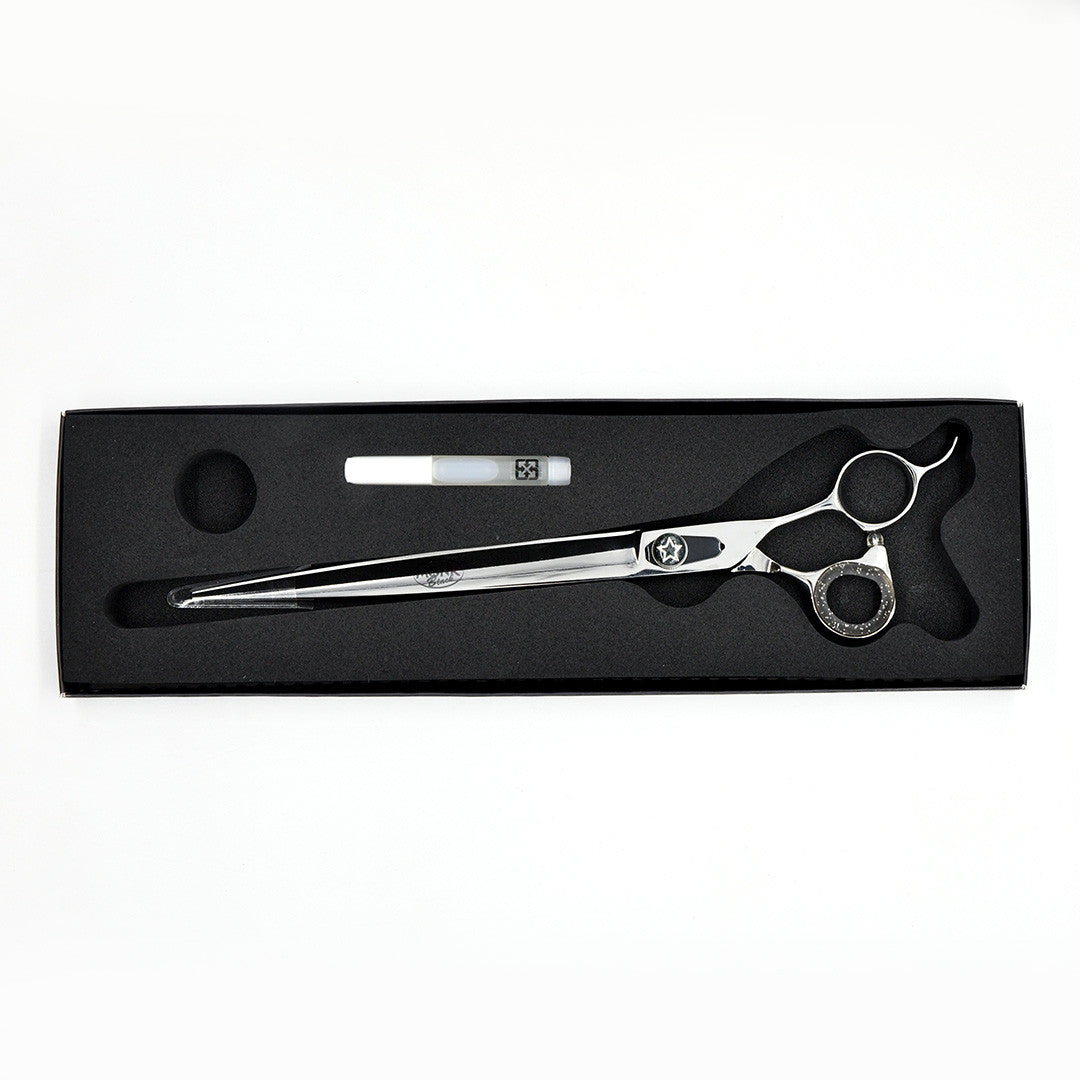 Monk Black 9.5" Straight Shear in a protective black foam-lined case with gel finger ring and shear oil