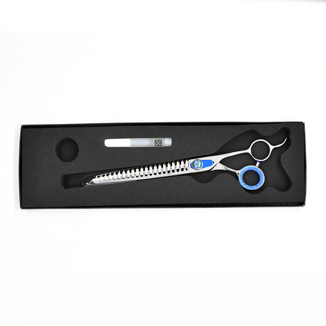 Monk Blue 8.5" 21-Tooth Blending Shear in a protective black foam-lined case with gel finger ring and shear oil