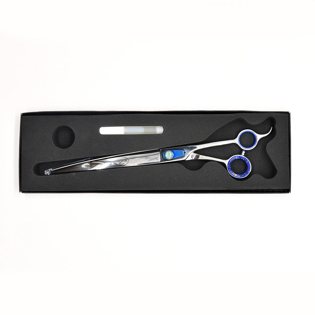 Monk Blue 10" Curved Shear in a protective black foam-lined case with gel finger ring and shear oil