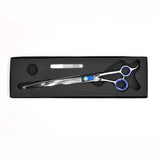 Monk Blue 10" Curved Shear in a protective black foam-lined case with gel finger ring and shear oil