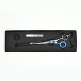 Monk Blue 6.5" Straight Shear in a protective black foam-lined case with gel finger ring and shear oil