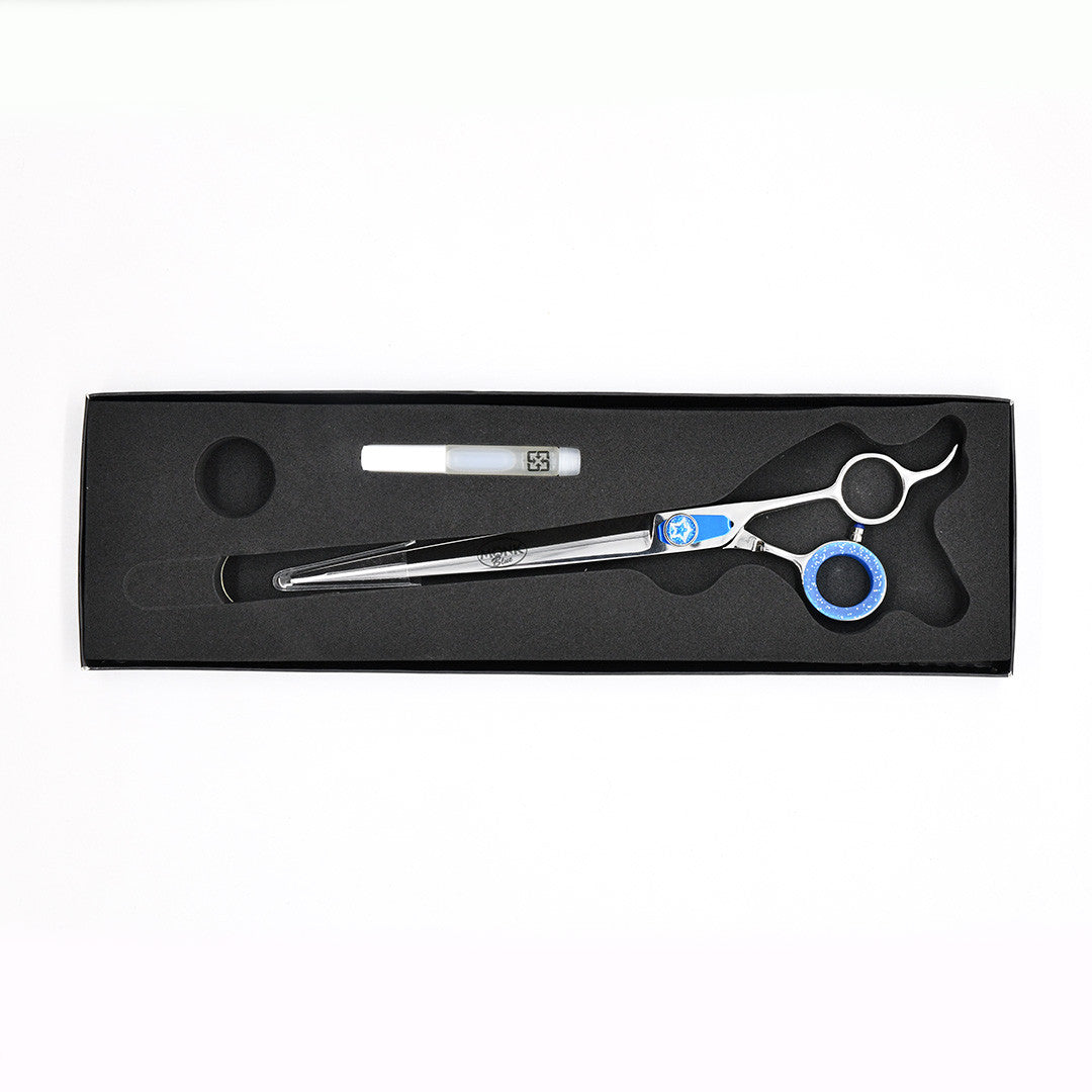 Monk Blue 8.5" Straight Shear in a protective black foam-lined case with gel finger ring and shear oil
