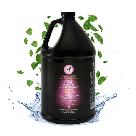 Gallon jug of Petology Keratin Fortifying Finishing Spray, emerging from a splash of clear water and surrounded by green leaves
