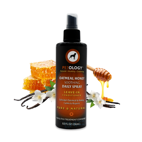 8 oz bottle of Petology Oatmeal Honey Soothing Daily Spray, displayed with honeycomb, dripping honey, vanilla pods and white vanilla orchid flowers
