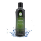 16 oz bottle of Petology Sensitive Therapeutic Shampoo, emerging from a splash of clear water