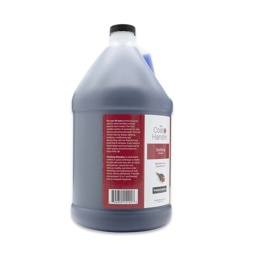 Left side view of The Coat Handler Clarifying Shampoo gallon jug, showcasing product description