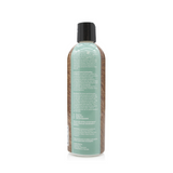 Back view of The Coat Handler Undercoat Control DeShedding Conditioner 16 oz bottle, showcasing product label with ingredients and description