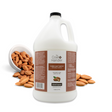 Gallon jug of The Coat Handler Undercoat Control DeShedding Conditioner, displayed with whole almonds spilling from a white bowl