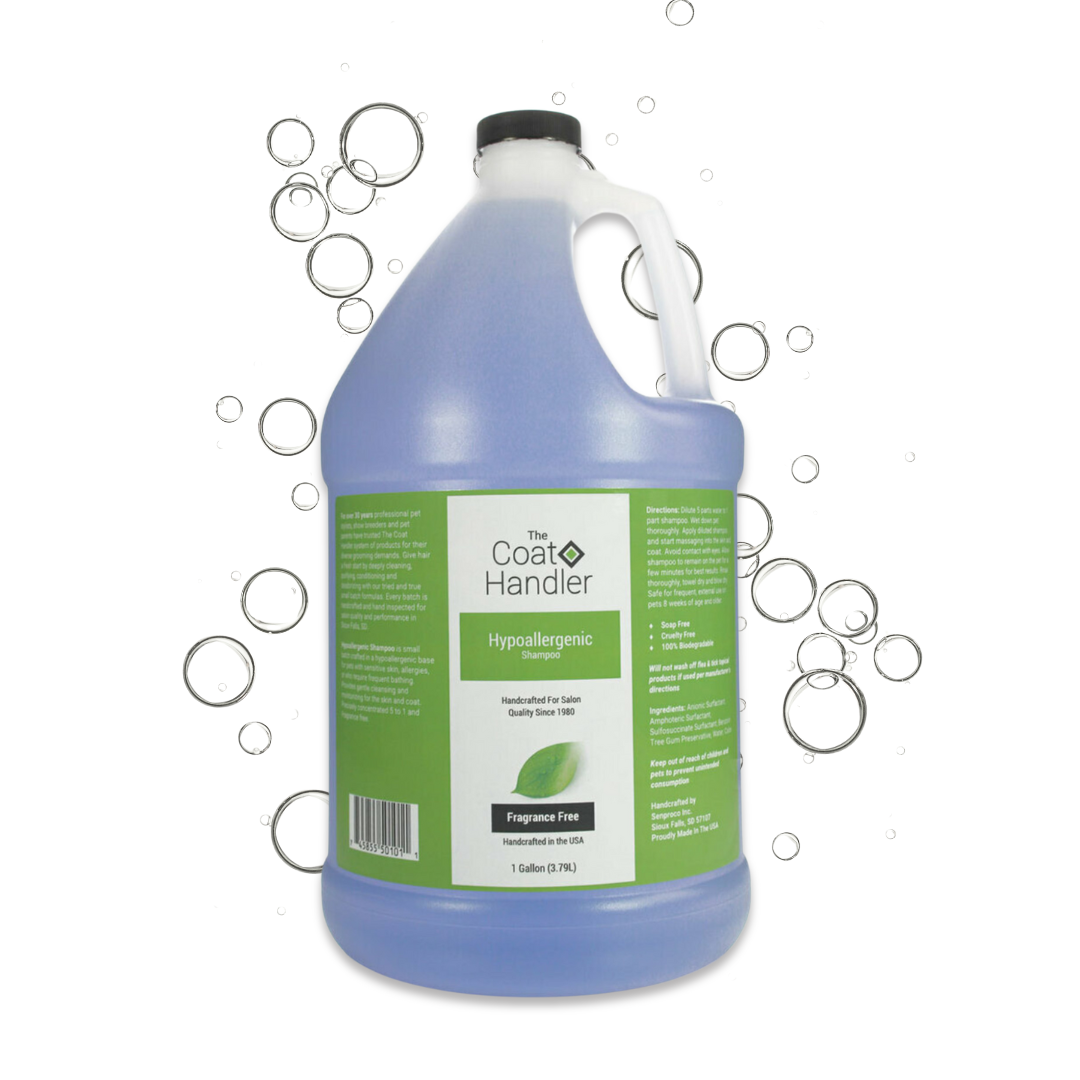 Gallon jug of The Coat Handler Hypoallergenic Shampoo displayed with iridescent soap bubbles