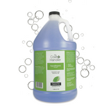 Gallon jug of The Coat Handler Hypoallergenic Shampoo displayed with iridescent soap bubbles