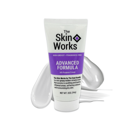 2 oz tube of The Skin Works displayed with a soft, creamy lotion texture in the background