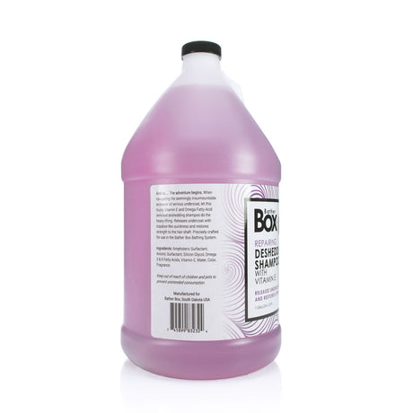 Side view of BatherBox® Deshedding Shampoo gallon jug, showcasing product label with ingredients and description