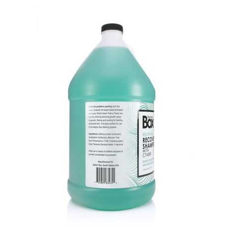 Side view of BatherBox® Relieving Recovery Shampoo gallon jug, showcasing product label with ingredients and description